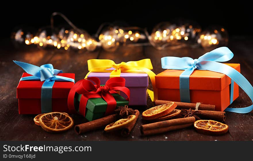 Fragrant star anise and cinnamon on wooden table and christmas g