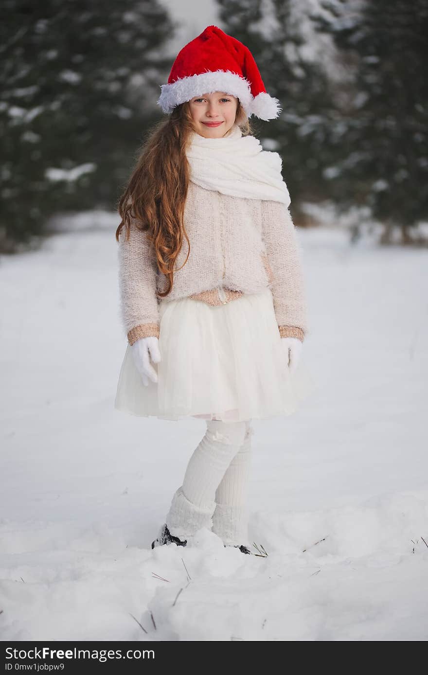 Little Happy Beautiful Girl In Winter Forest