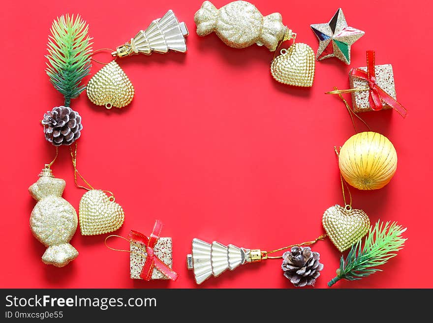 Christmas Decoration and copy space on red background.