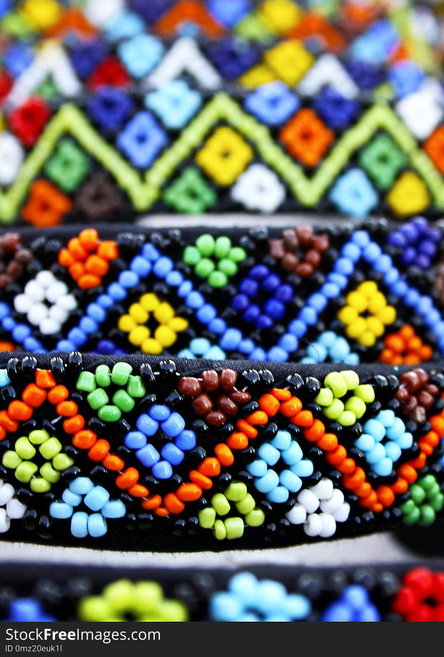 Zulu beads are traditionally worn, often used as symbols or love letters