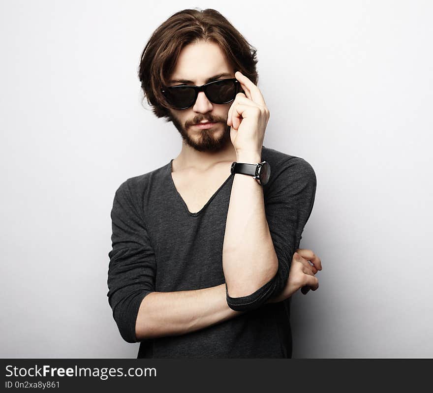 Fashion Man Wearing Fashionable Sunglasses On White Background