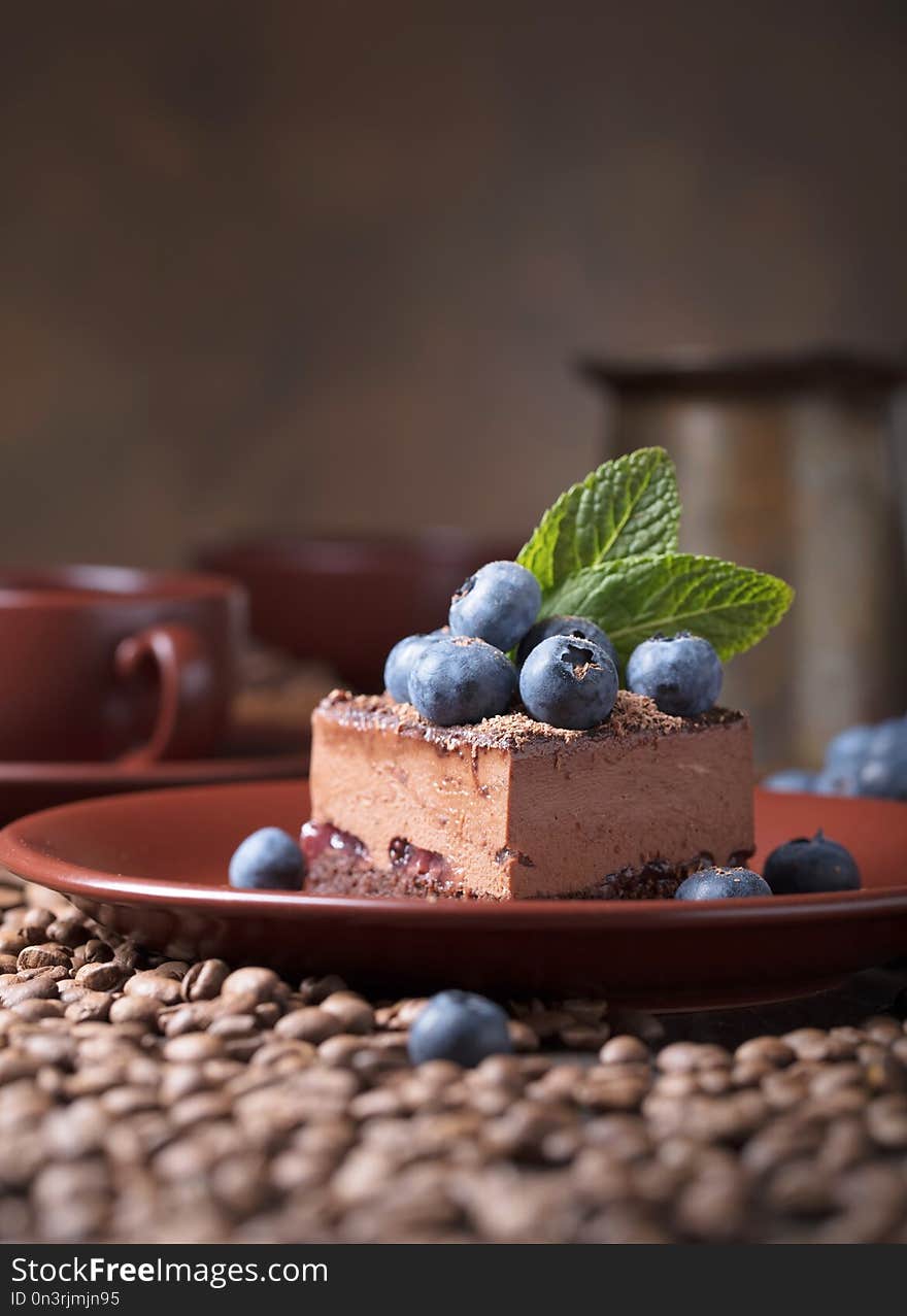 Chocolate Cake With Blueberries And Mint .