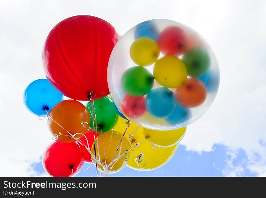 Bright Colorful Balloons Over Blue Sky Background