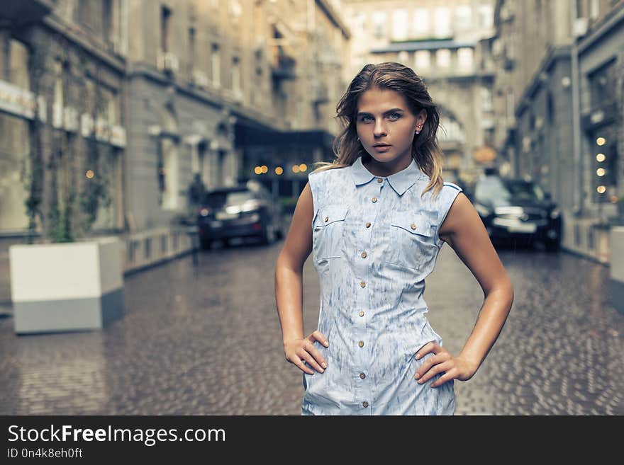 Walk with a girl in urban summer landscapes. Walk with a girl in urban summer landscapes