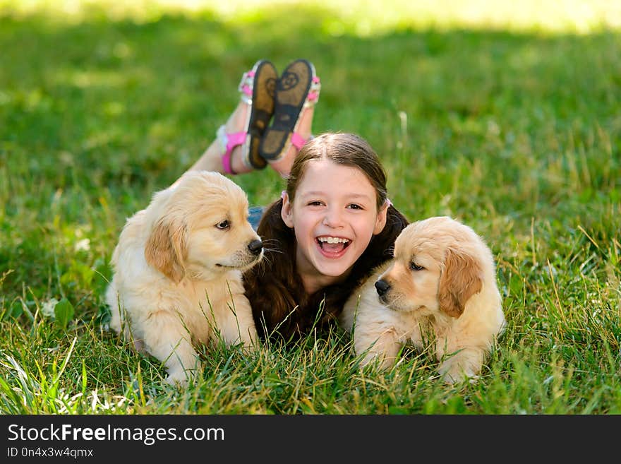 Girl on stroll with puppies