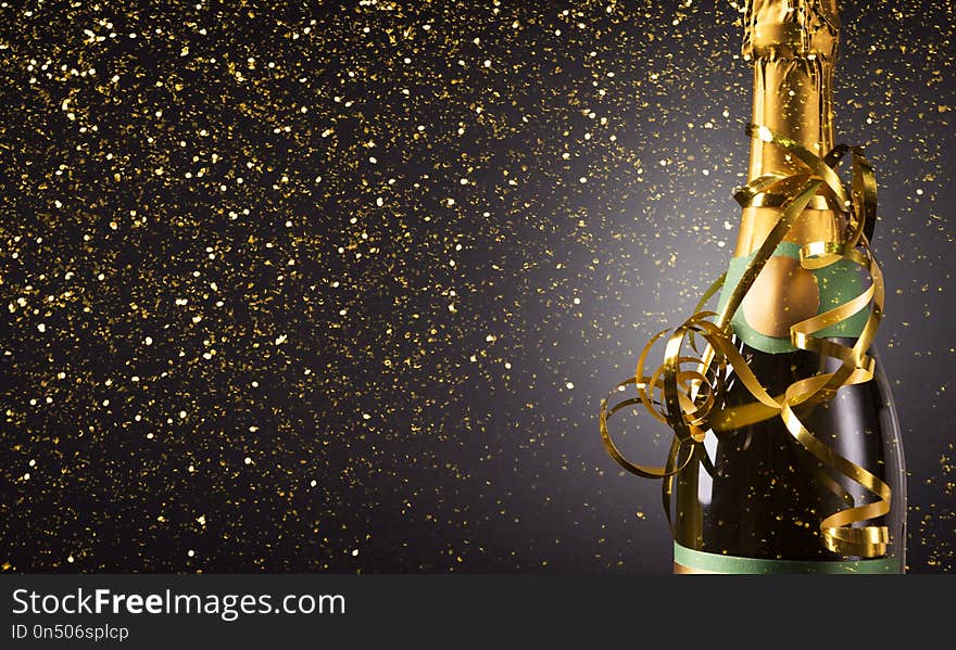 Champagne bottle on christmas shiny background. Champagne bottle on christmas shiny background