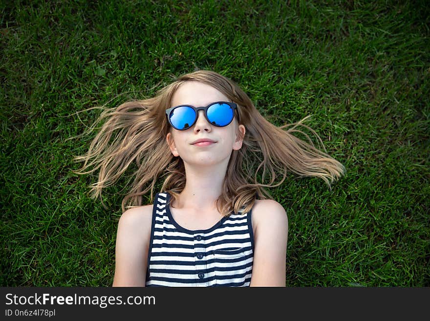 Happy girl in sunglasses