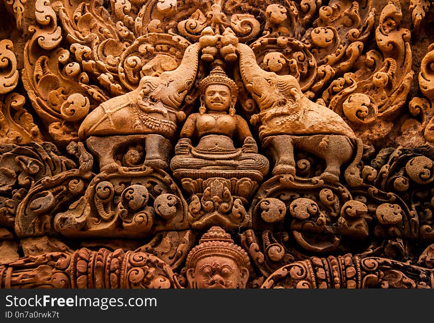 Gods and elephants in the sandstone bas reliefs at Angkor Wat, Cambodia. Gods and elephants in the sandstone bas reliefs at Angkor Wat, Cambodia