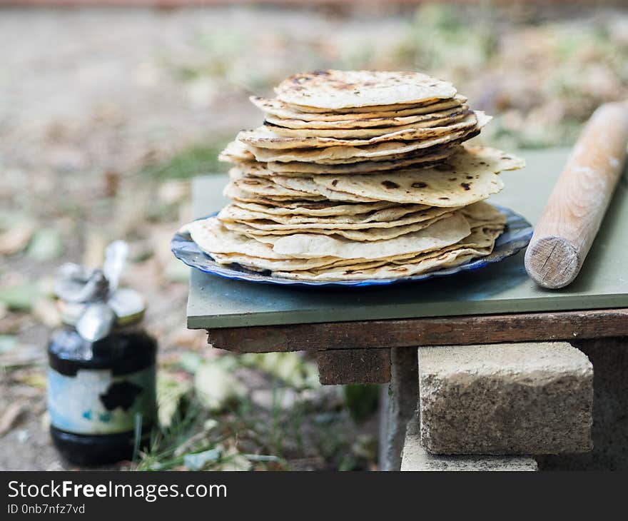 Chapati. Products made from flour. Cooked on water. On an open fire. With the addition of spices and salt. Unleavened cakes from d