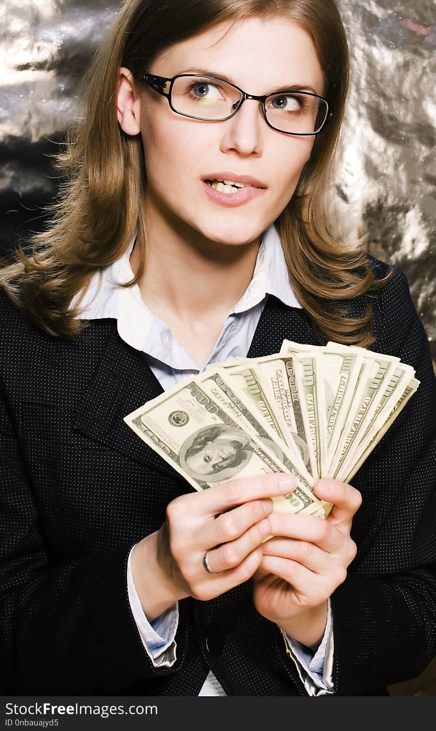 Pretty young brunette real modern woman in glasses with money cash isolated on white background happy smiling, lifestyle people concept close up