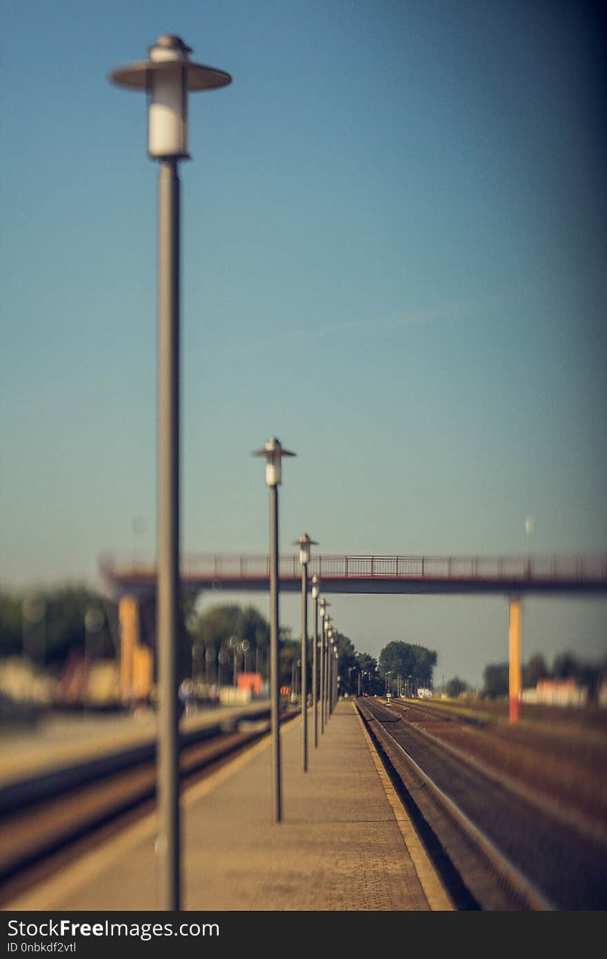 Railway station, rails and sleepers, blur. Railway station, rails and sleepers, blur