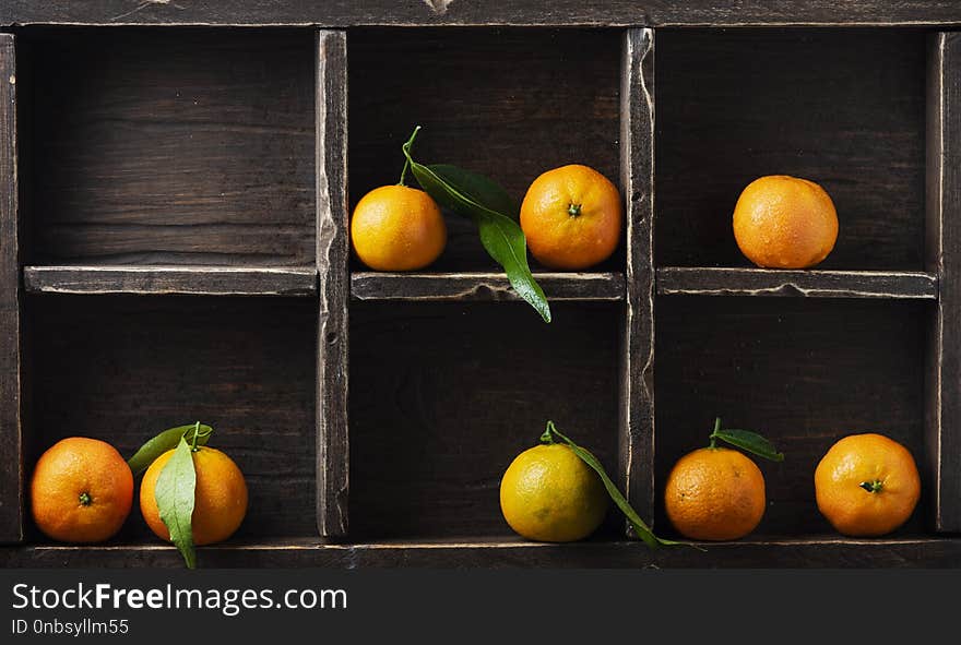 Fresh Sweet Mandarins On The Wooden Table