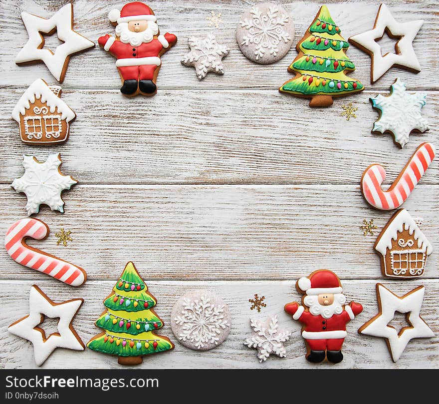 Christmas homemade gingerbread cookies on a old wooden background