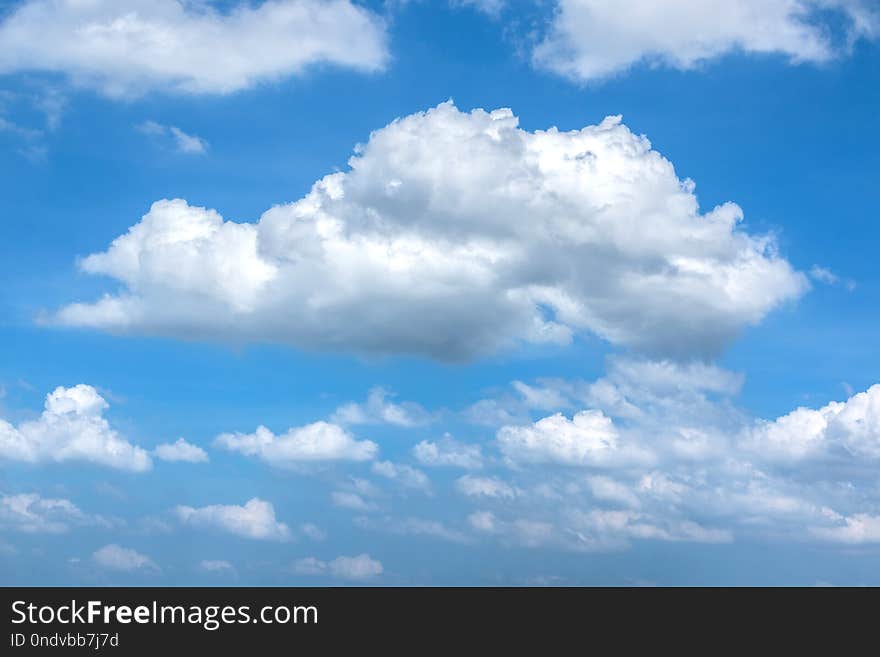 Puffy White Clouds in Blue Sky for Natural Background