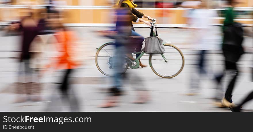 Bicycle Rider In The Rainy City