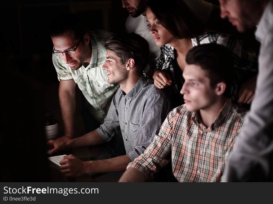 Business team at the workplace at night