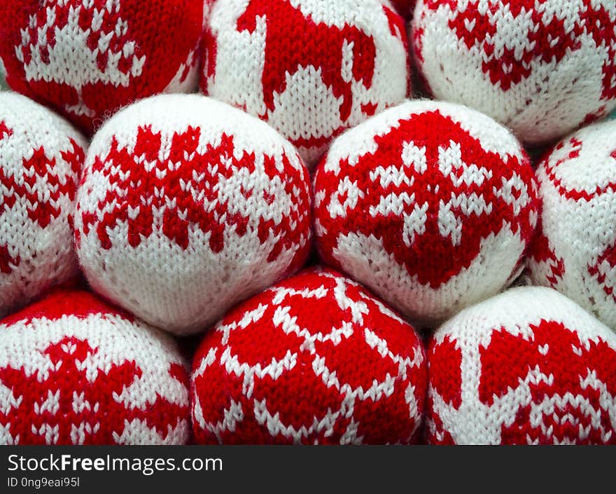 View of knitted balls with ornament for new year and christmas decoration