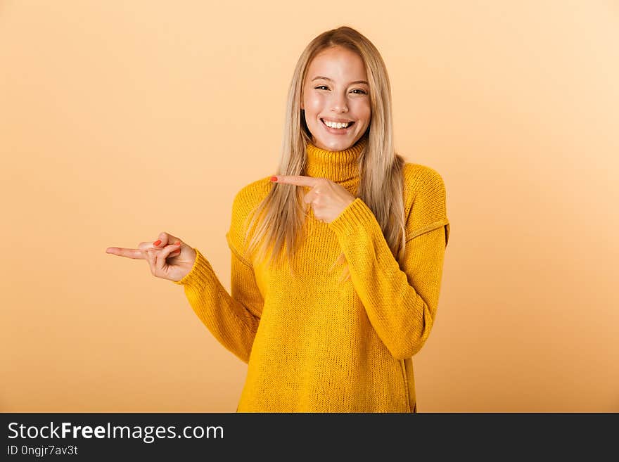 Portrait of a lovely young woman dressed in sweater