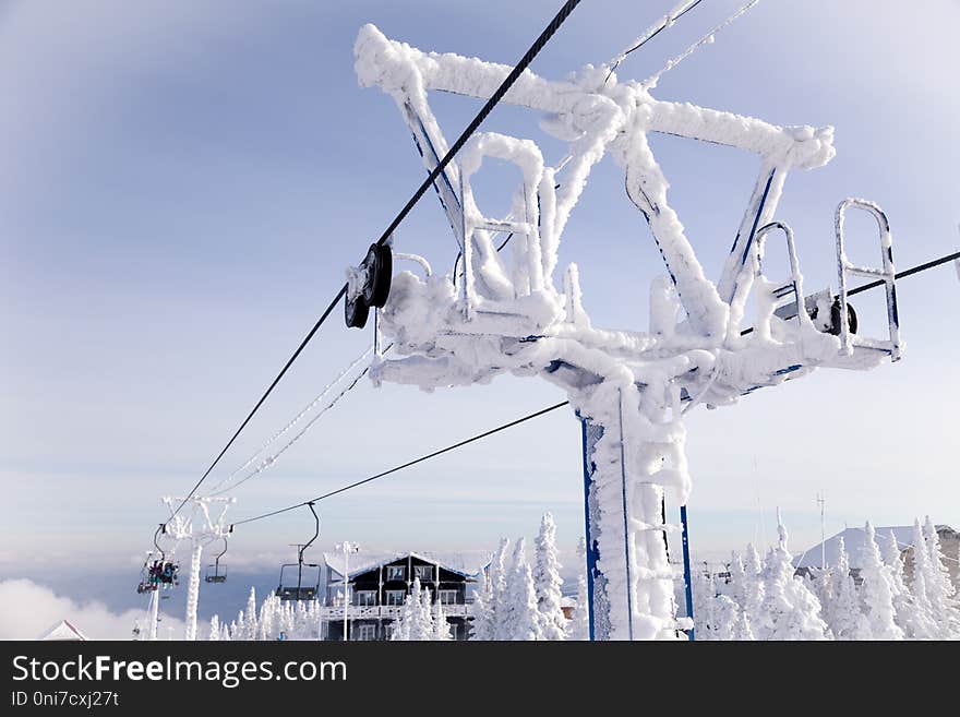 Ski lift, cable car funicular with open cabin on the background