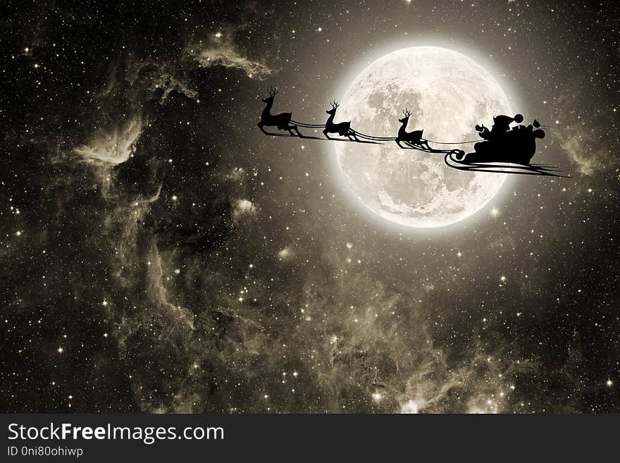 Silhouette of a flying goth santa claus against the background of the night sky. Elements of this image furnished by NASA. Silhouette of a flying goth santa claus against the background of the night sky. Elements of this image furnished by NASA