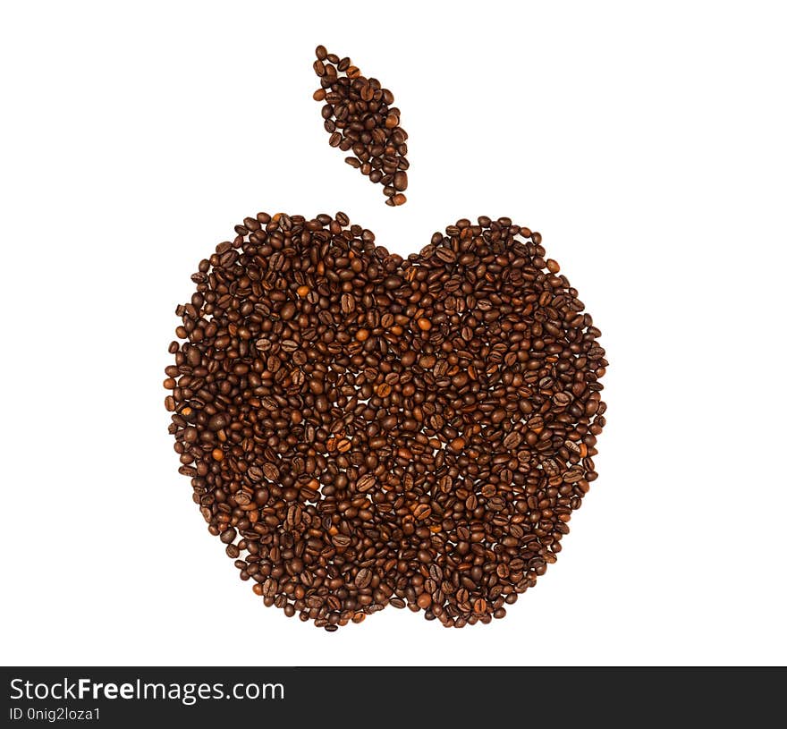 Coffee beans spread out in the form of apple (pomum) and isolated on white background, top view