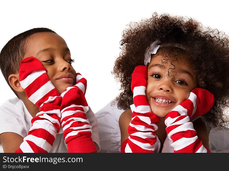 Portrait Of A Preschool Aged Children Laying Downin. Studio Shot. Isolated