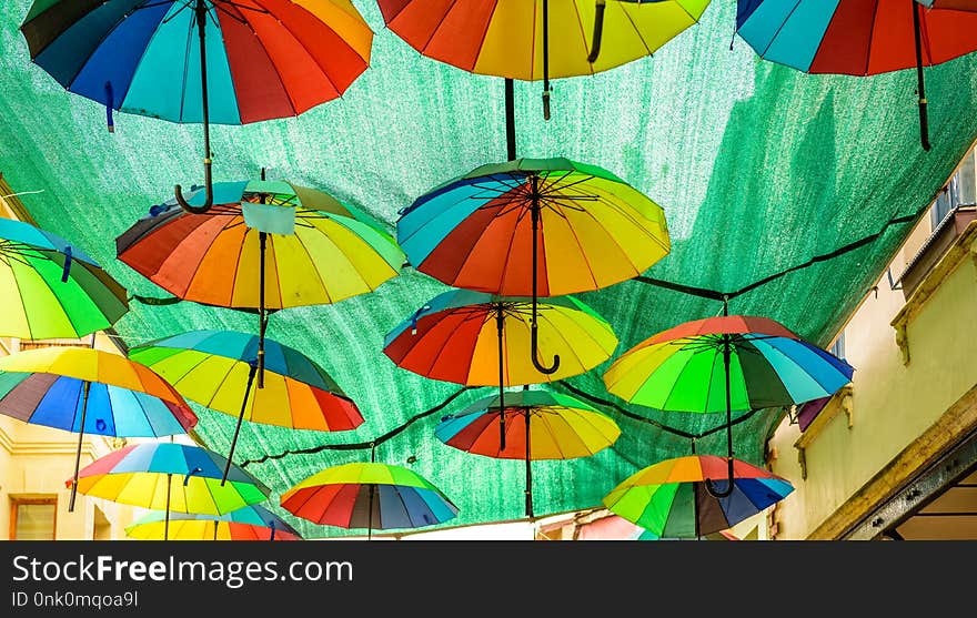 Colorful Hanging Umbrellas Above The Street