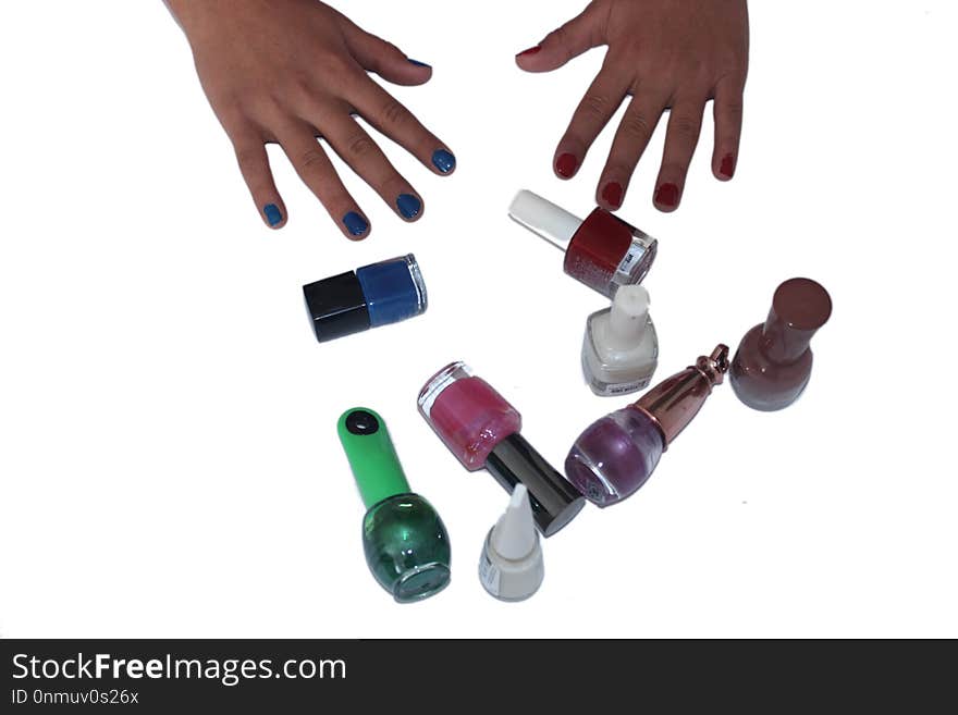 Girl with colorful nailpolish in hand. Girl with colorful nailpolish in hand