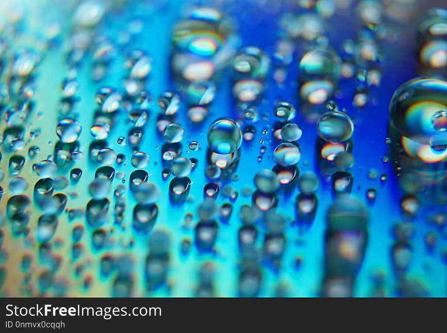 Abstract art with Water droplets on a colorful surface