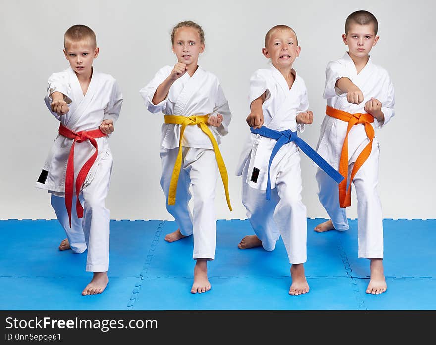 Children in karategi beats blows. Children in karategi beats blows