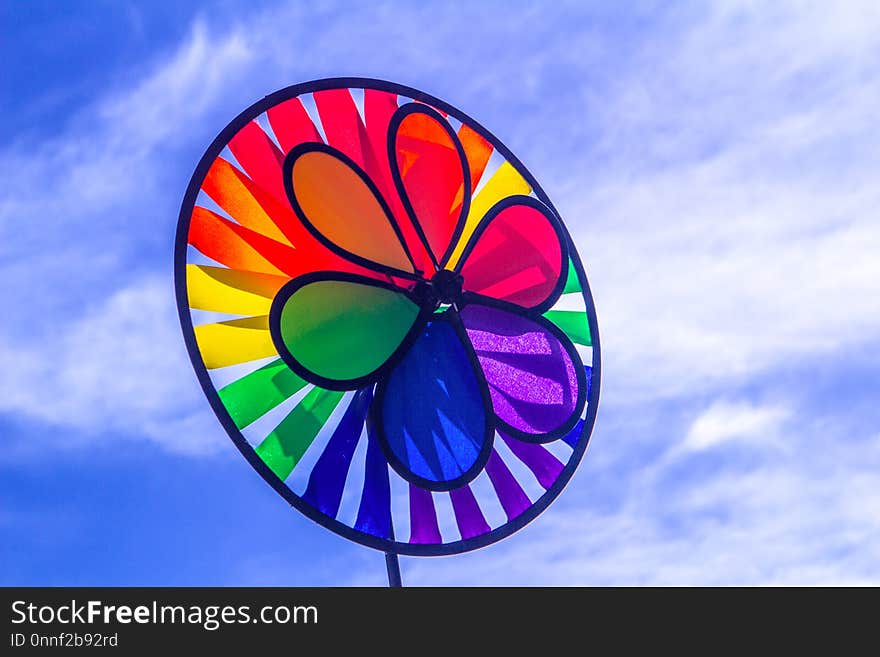 Rainbow lgbt pride spinning pinwheel. Symbol of sexual minorities, gays and lesbians.