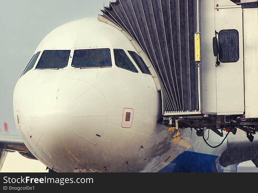 Passenger Plane Under The Pouring Rain