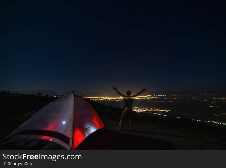 Watching The City From The Hill And Camping