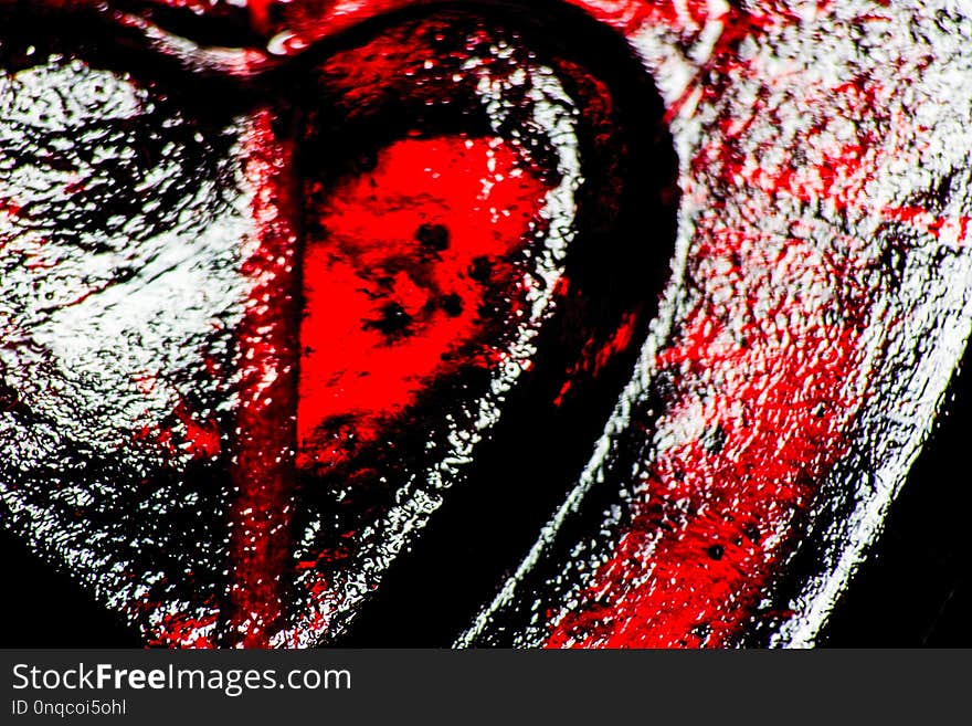 Red heart shaped lollipop is macro