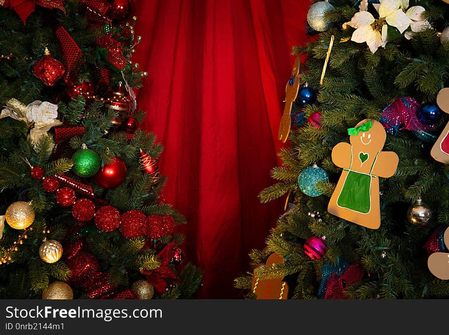 Decorated Christmas Trees with a red background