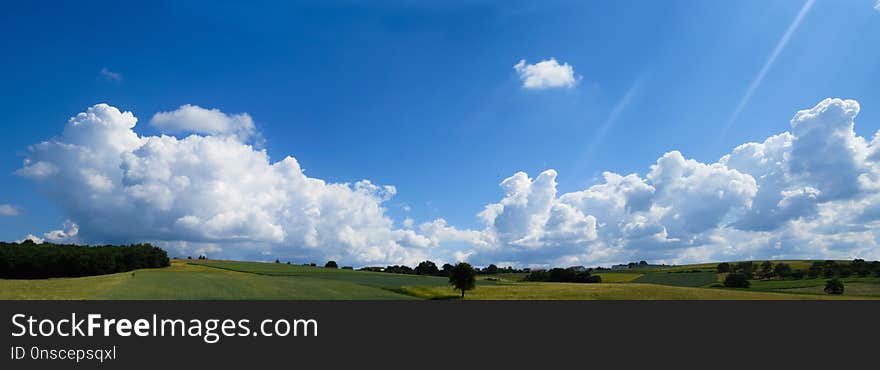 Sky, Cloud, Grassland, Daytime