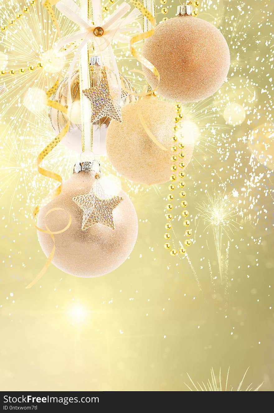 Hanging golden christmas balls row on golden bokeh background with copy space. Hanging golden christmas balls row on golden bokeh background with copy space