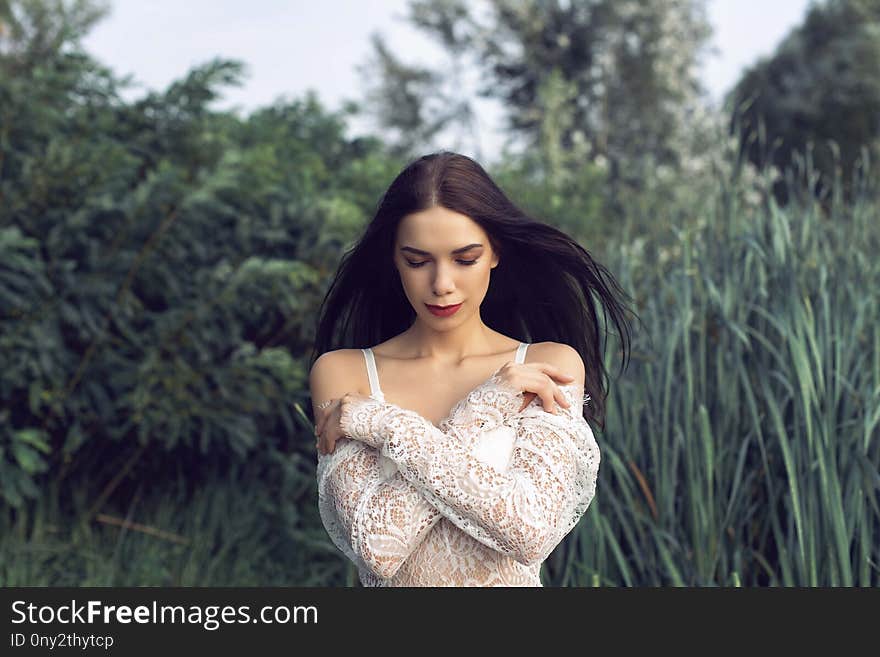 The girl in the forest near the river