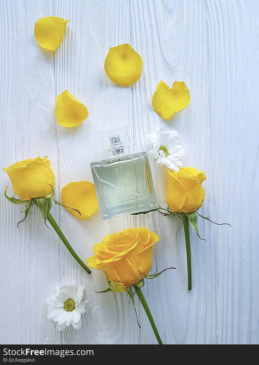 Perfume flower yellow fresh rose on wooden background aromatic. Perfume flower yellow fresh rose on wooden background aromatic