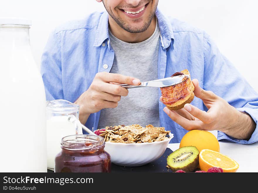 Hands with jam toast and breakfast buffet, healthy diet