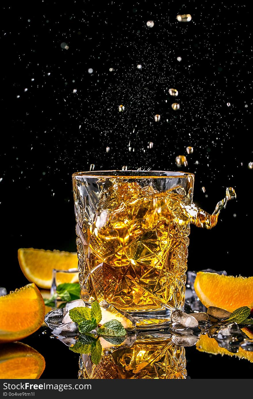 Elite alcoholic drink closeup. Two cognac portions in glass on black background, menu photo, copy space.