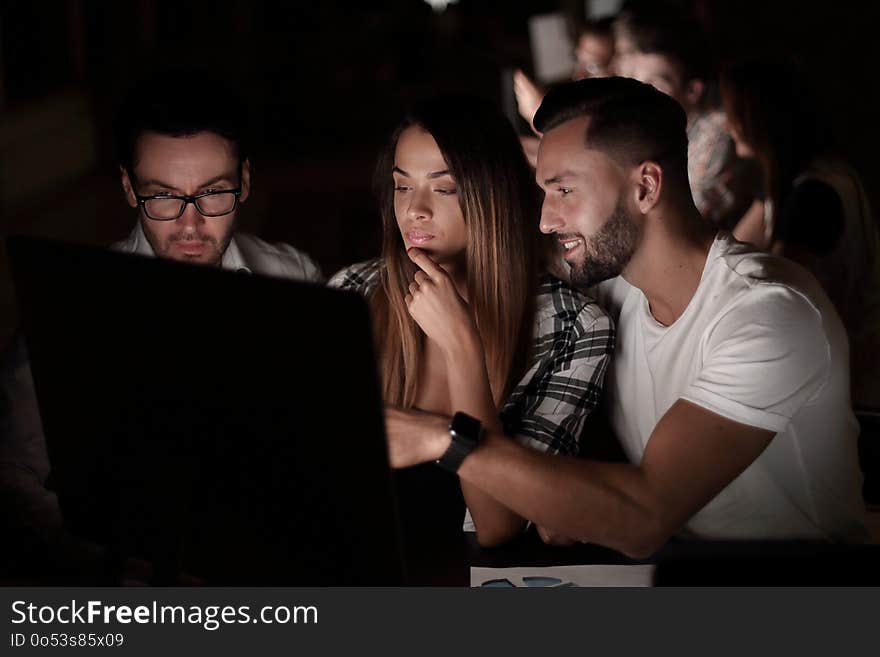 Young employees discussing new data