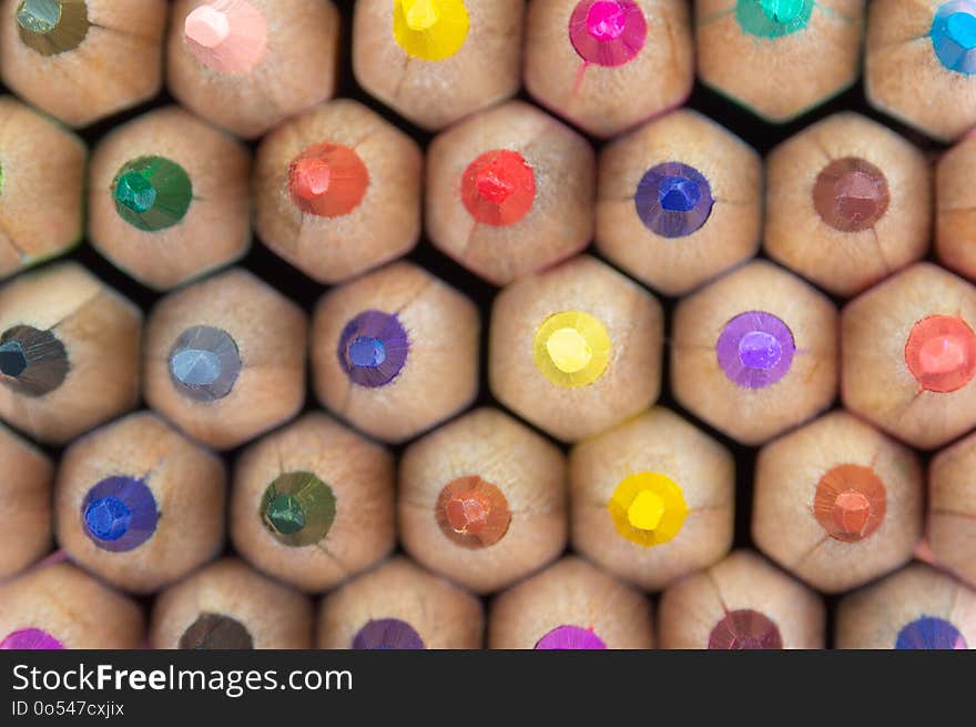 Color pencils bundle close-up; pattern : at color background concept. Color pencils bundle close-up; pattern : at color background concept