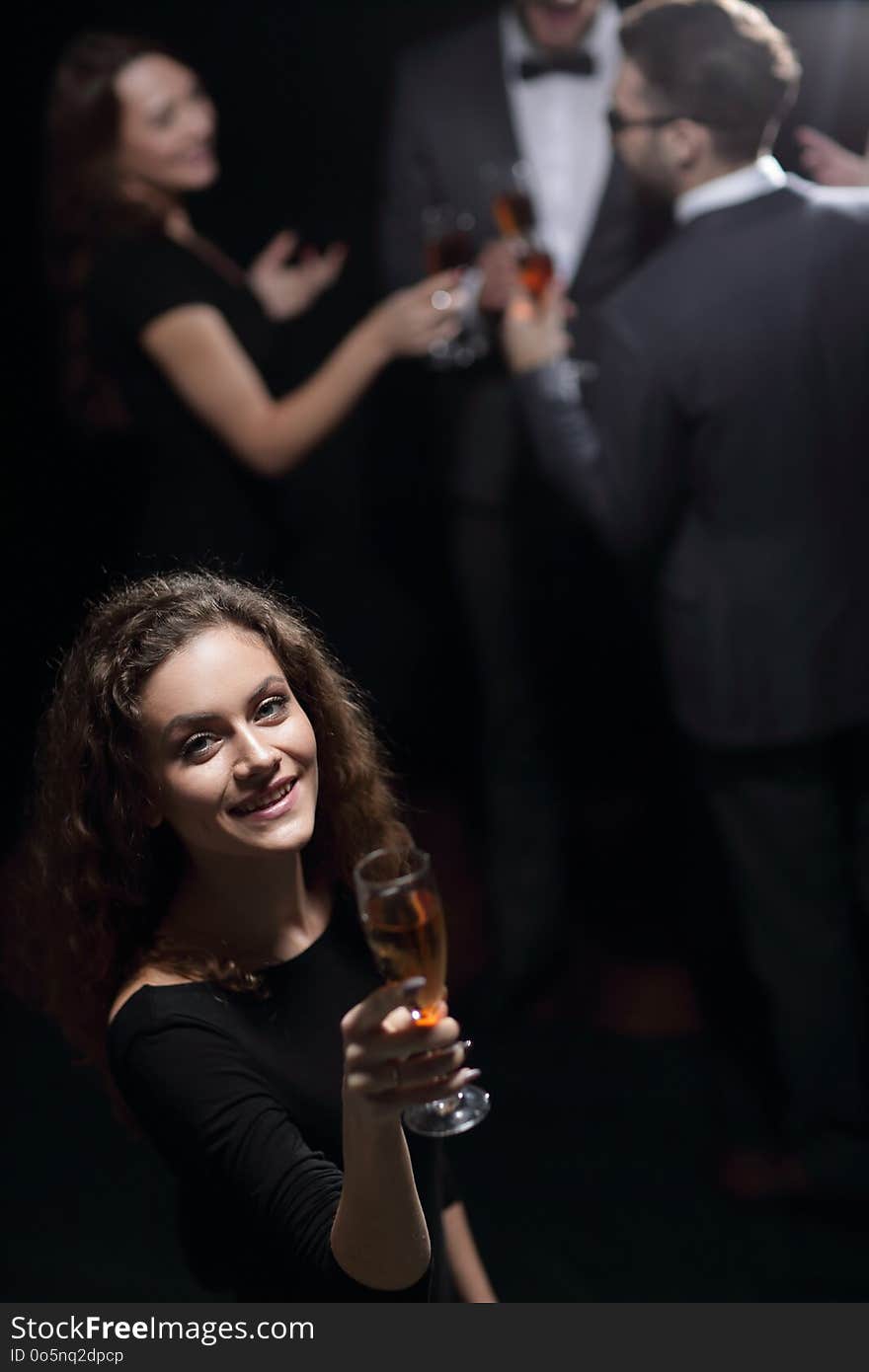 Stylish Young Woman With Glass Of Champagne