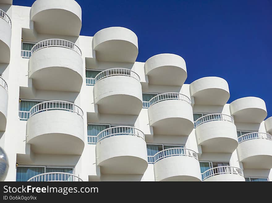 Balconies Of A Modern Building . Blue Sky Background