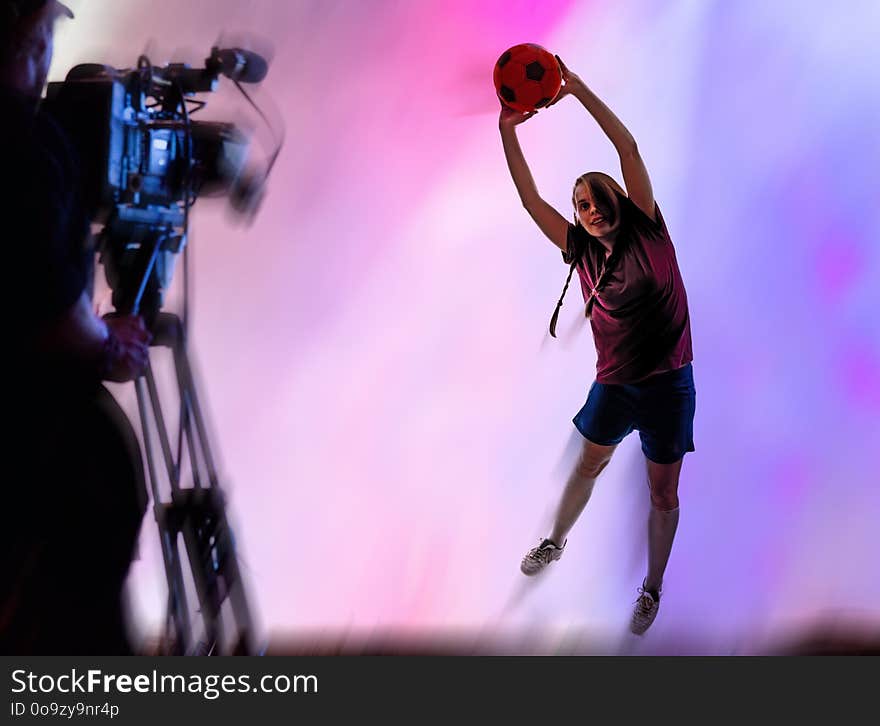 A goalkeeper in front of camera in a stadium