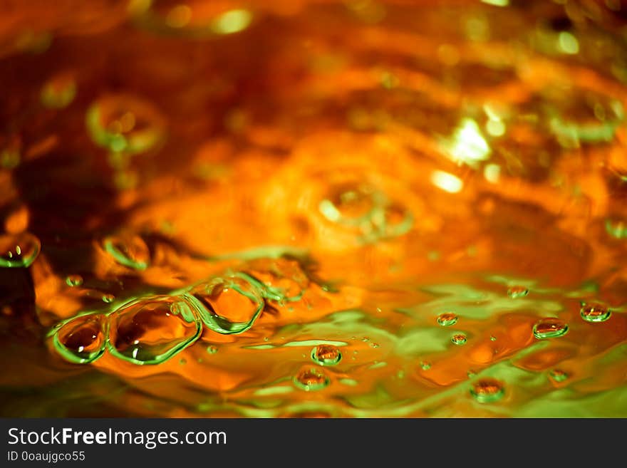 Multicolored yellow with green background with bubbles, soft focus