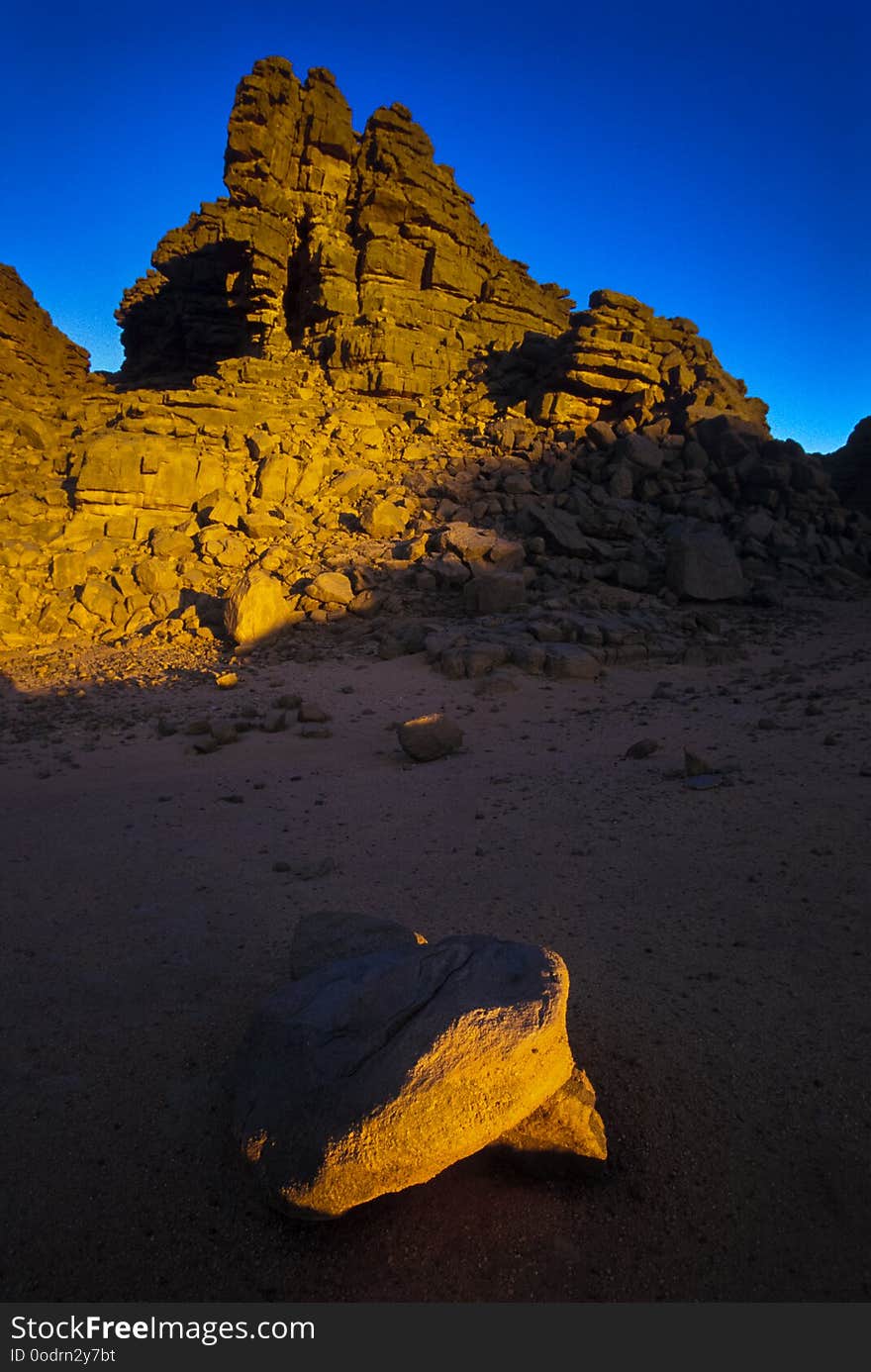 Africa, Algeria, Sahara, Tassili N`Ajjer National Park, Tadrart, rock towers and sand dunes. Africa, Algeria, Sahara, Tassili N`Ajjer National Park, Tadrart, rock towers and sand dunes