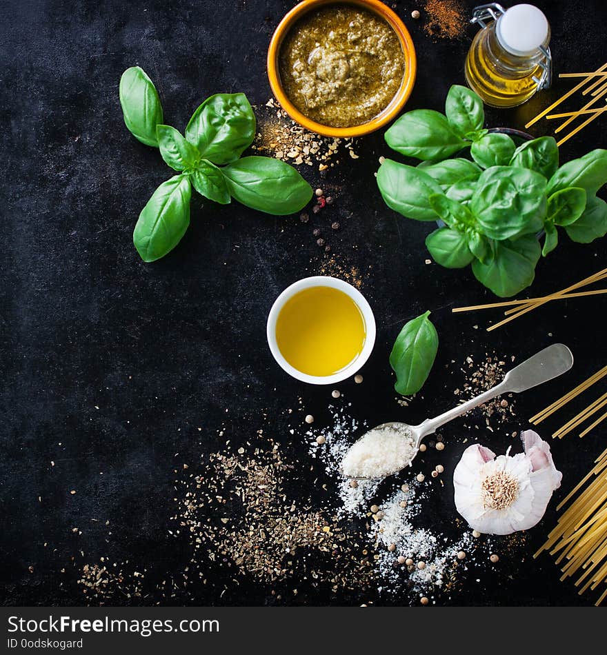 Food frame, italian food background, healthy food concept or ingredients for cooking pesto sauce on a vintage background. Top view. Square. Food frame, italian food background, healthy food concept or ingredients for cooking pesto sauce on a vintage background. Top view. Square