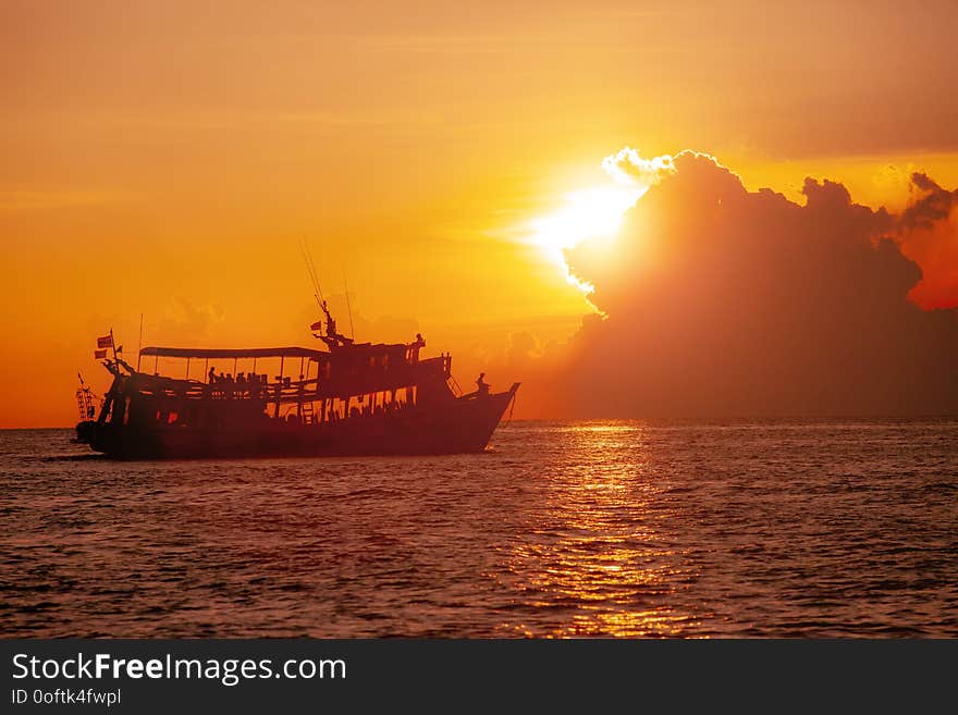 Tourist scuba diving boat and beautiful sunset sky at koh tao thailand